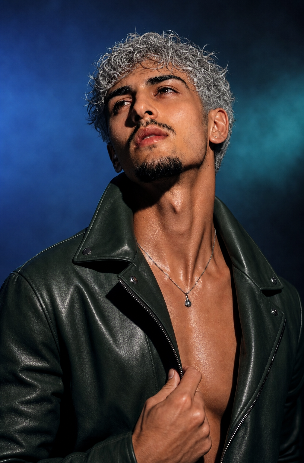 Androgynous model in forest-green open leather jacket