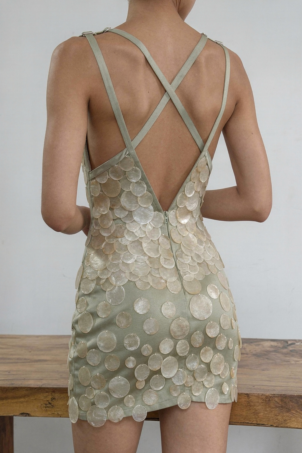 Backless Sage Pearl-Disc Mini Dress — flux-2-pro