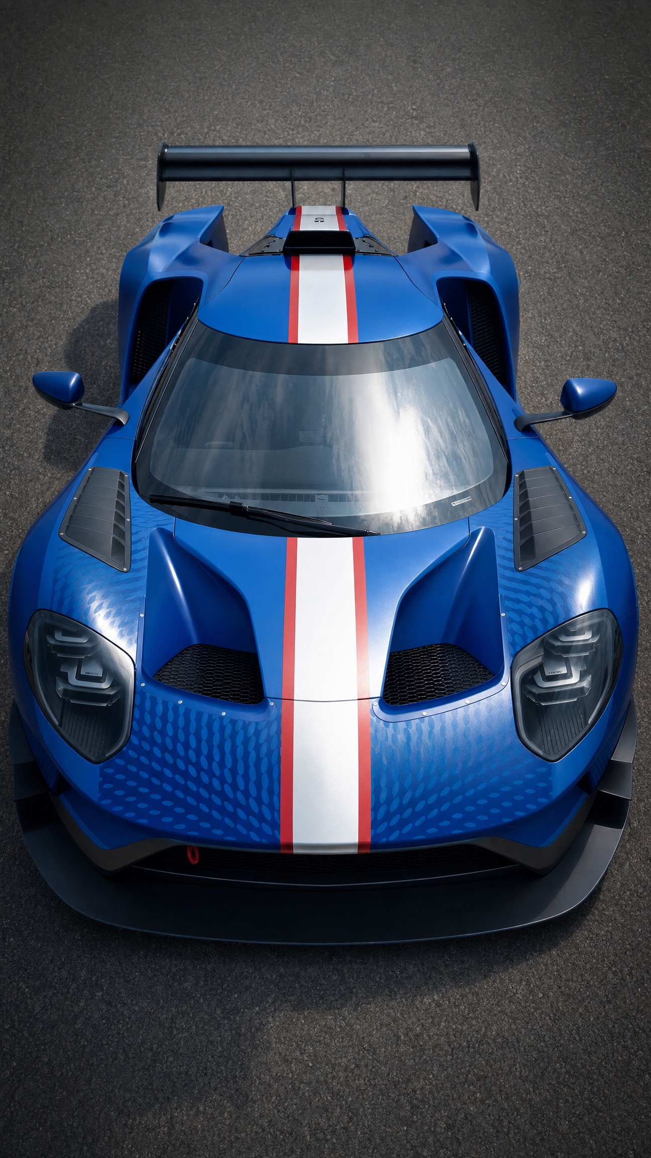 Blue Ford GT-Style Race Car With Red Stripes