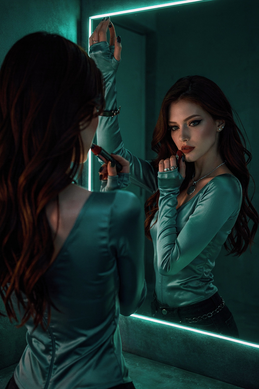Brunette Woman Applying Lipstick Under Teal Neon