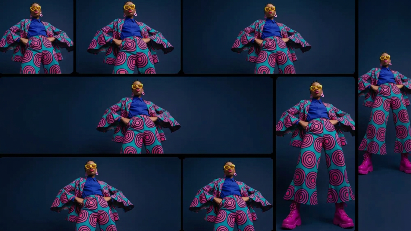 Confident model in cobalt blue spiral outfit