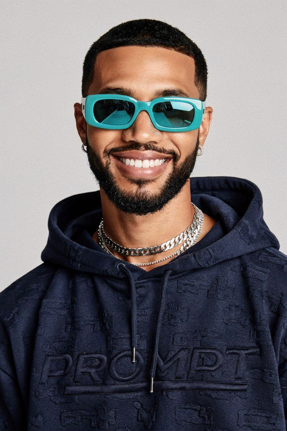 Confident studio portrait in teal tones — flux-2-pro