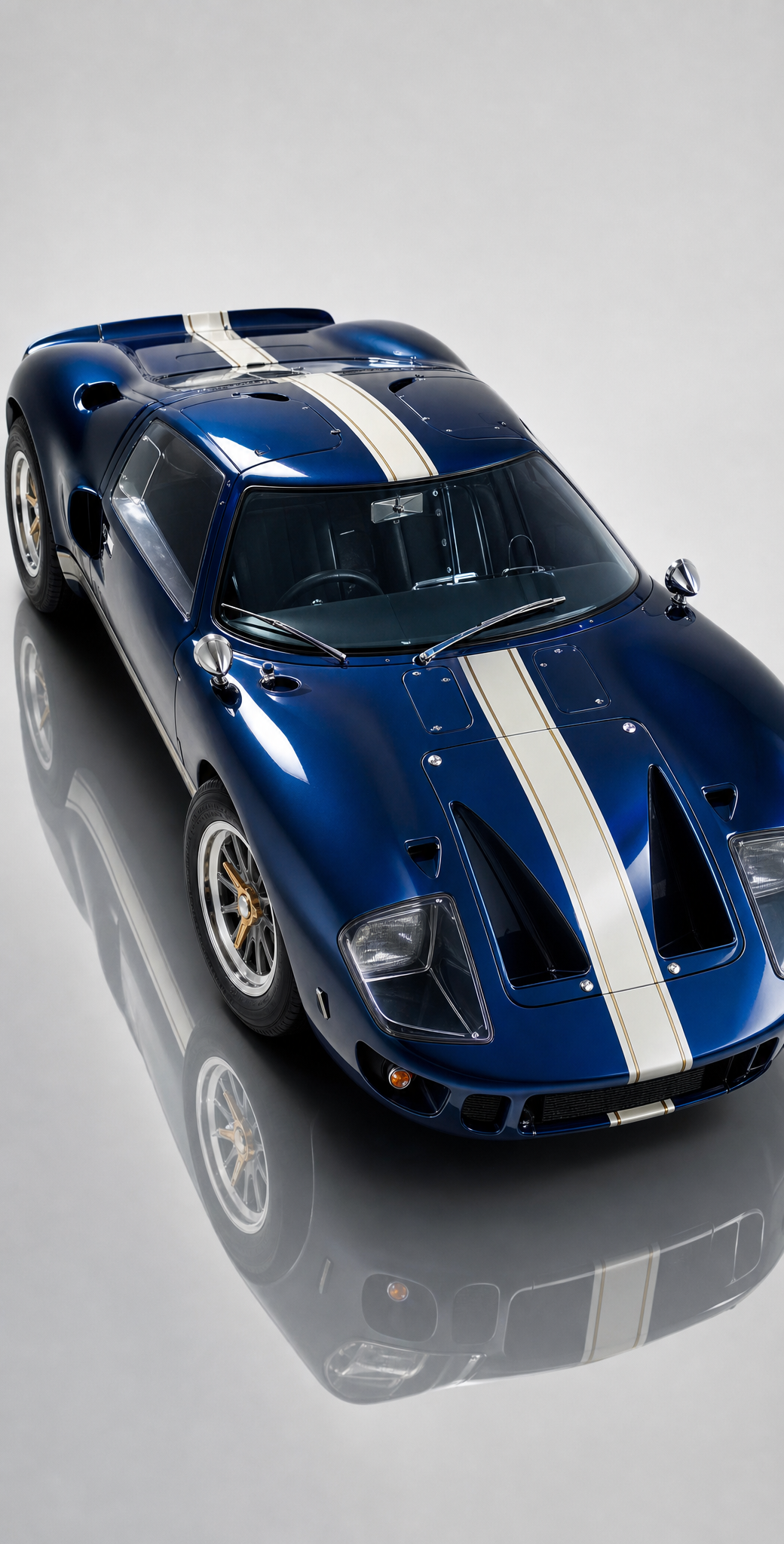 Deep metallic blue Ford GT40 with white stripes