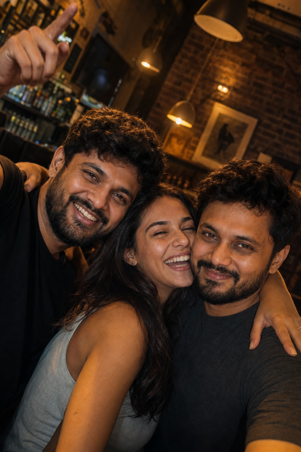 Friends Laughing Together in Warm Bar Light