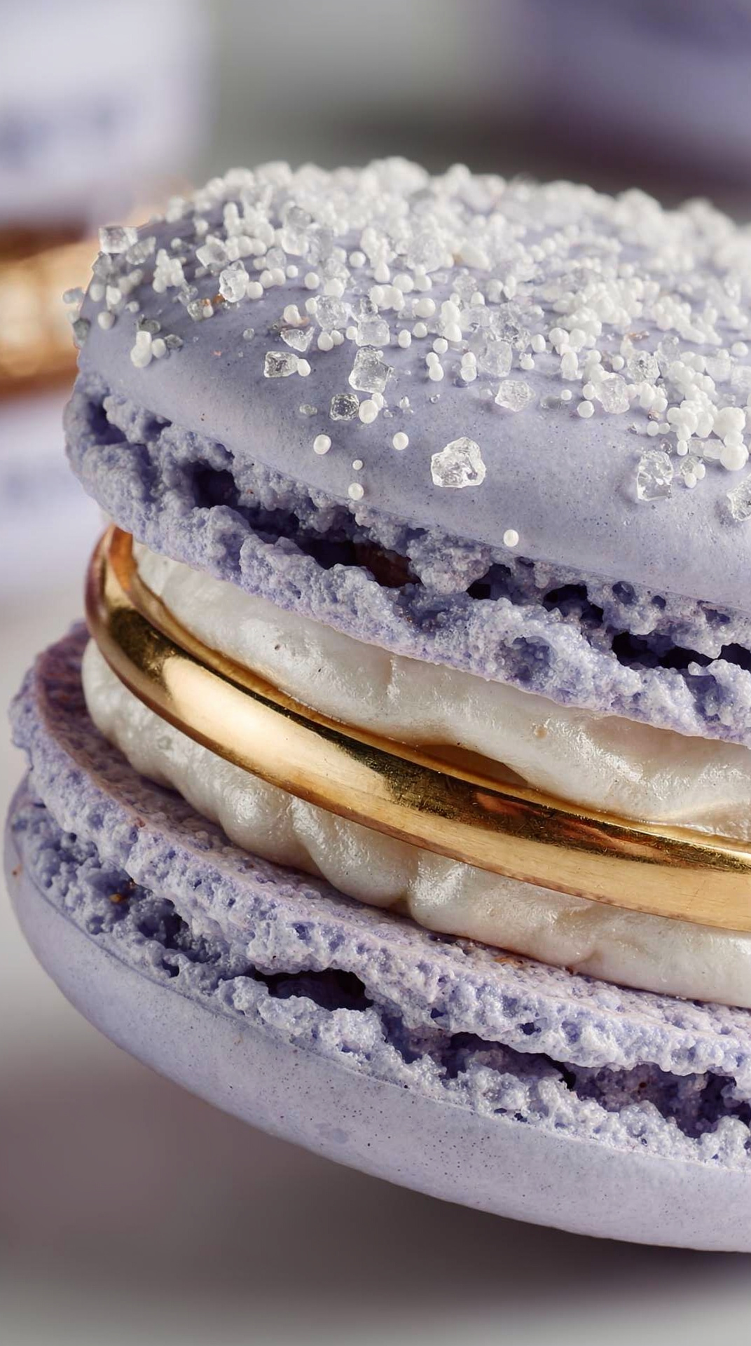 Lavender macaron with gold ring inside