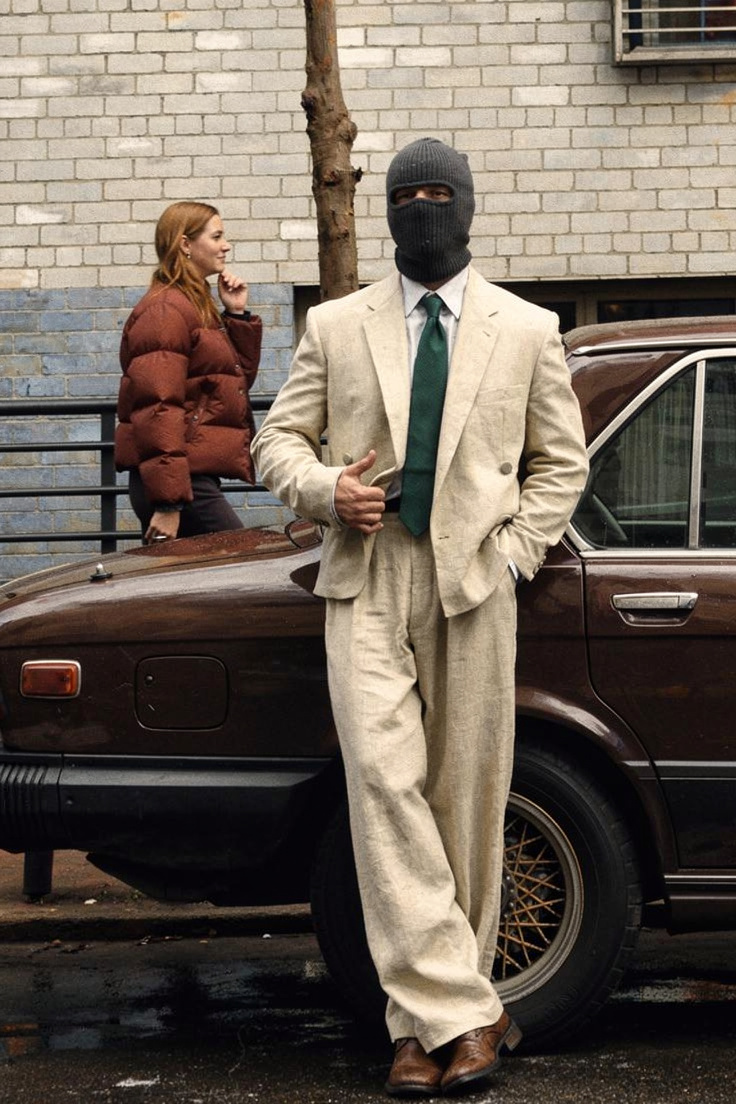 Man in sand-tan suit with green tie — Flux 2 Pro