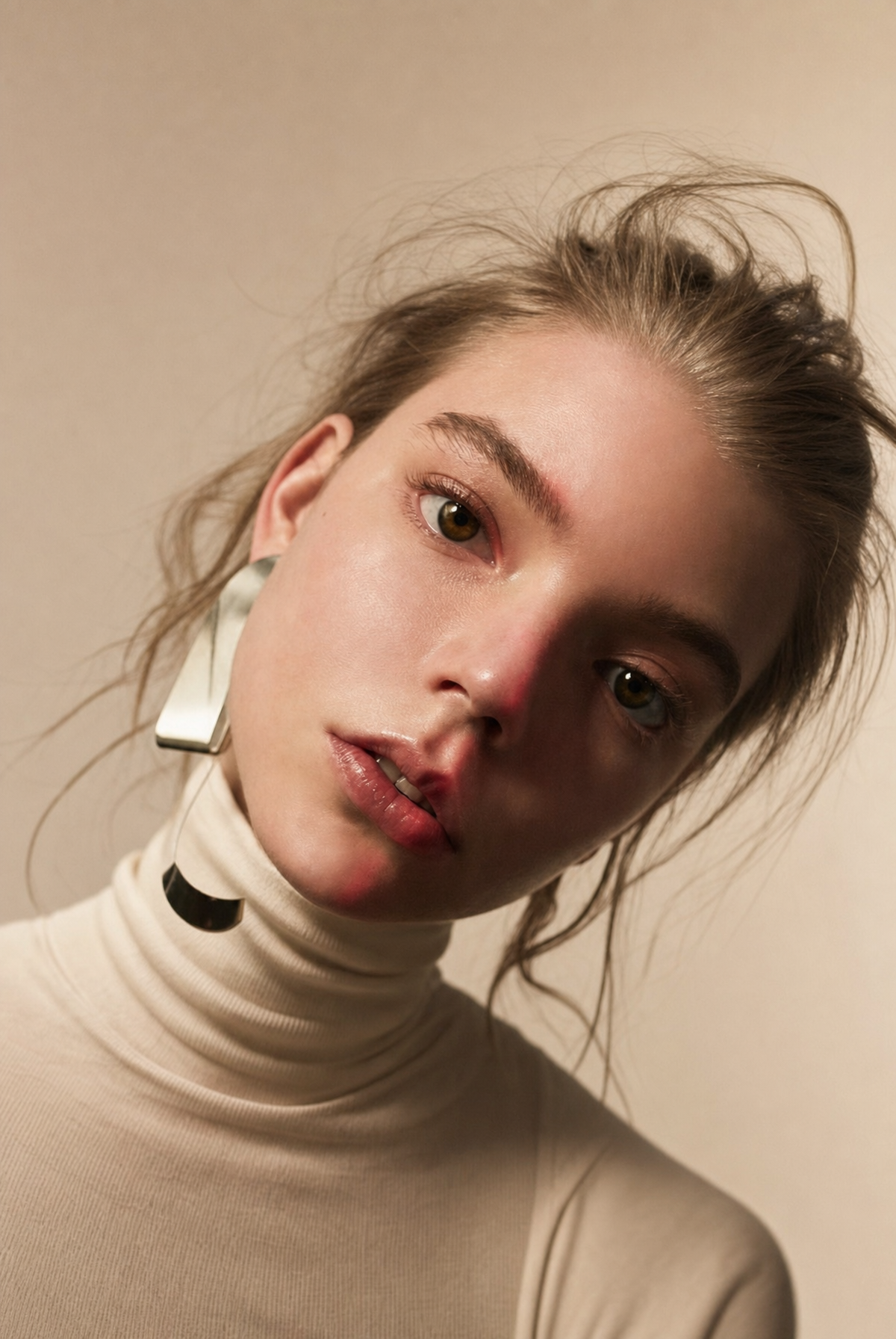 Moody editorial portrait with warm light