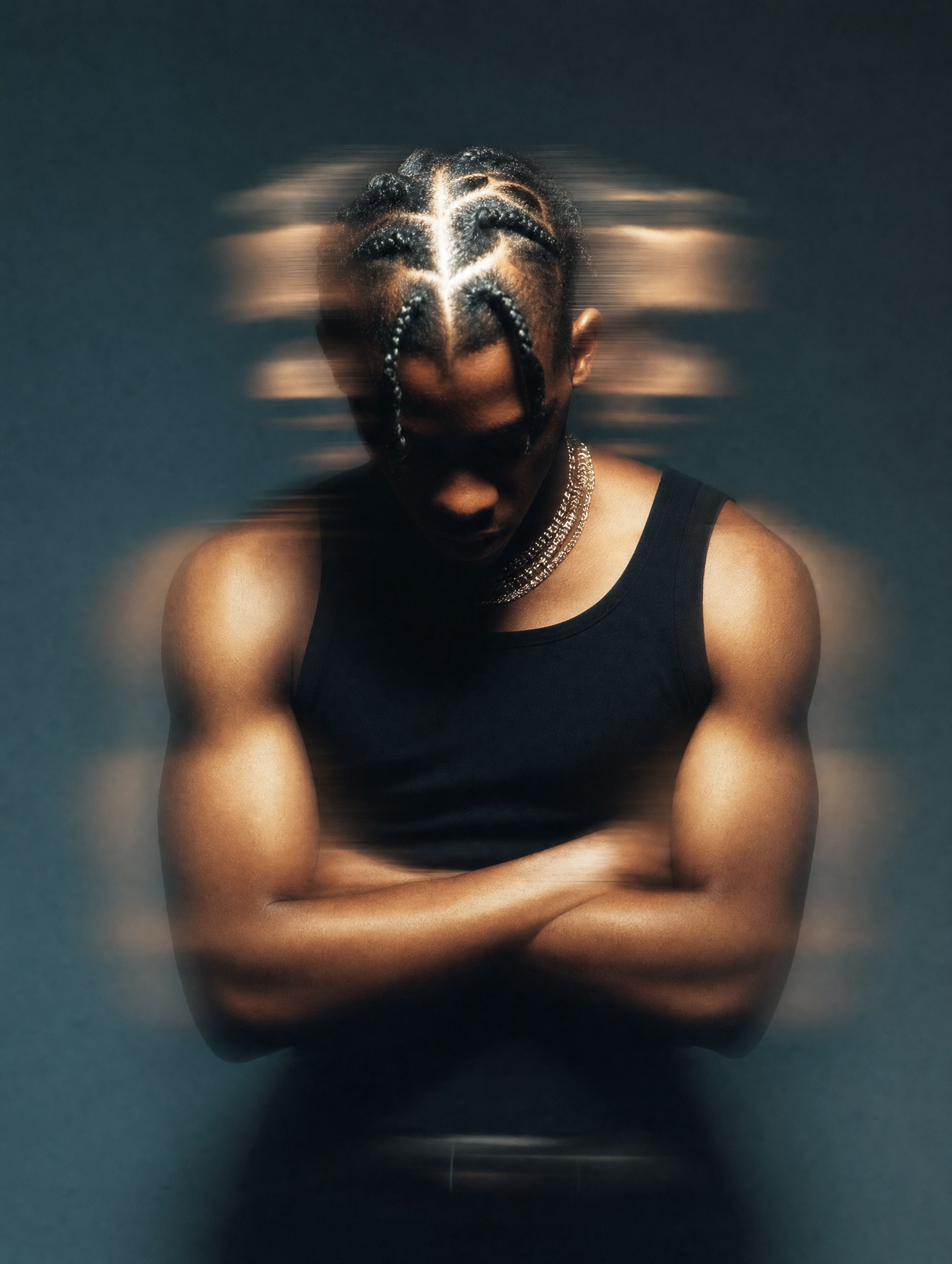 Moody kinetic portrait in dark studio
