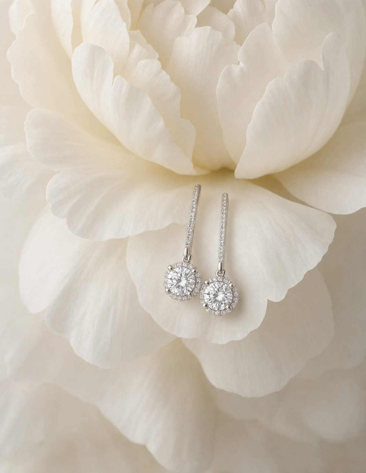 Platinum Diamond Drop Earrings on White Peony Petals