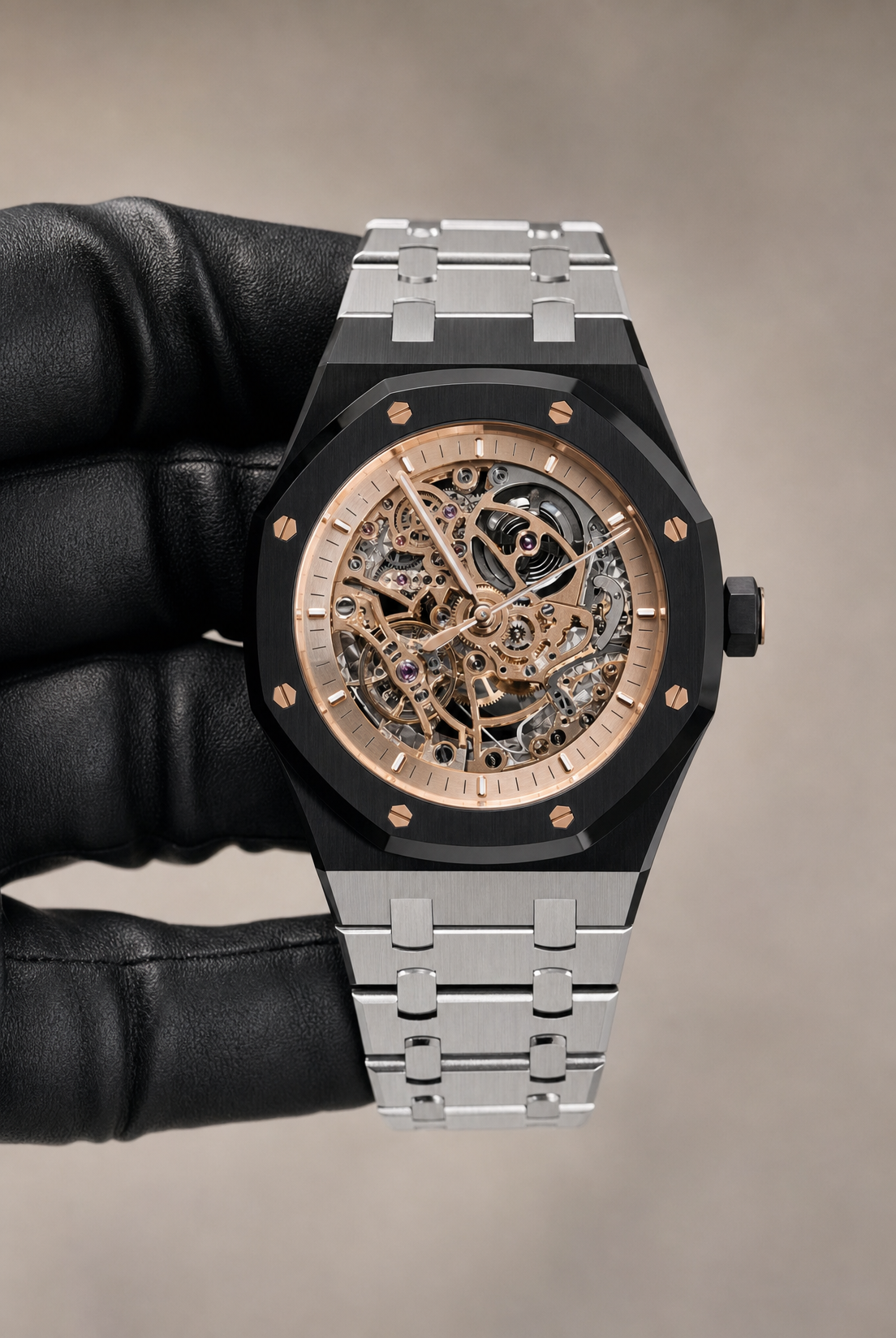Rose-gold skeleton wristwatch in black glove